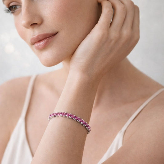 Pulseira ródio branco de rivieira 4 pontas na cor rosa pink