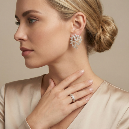 Brinco Espiral Navetes Cravejados em volta