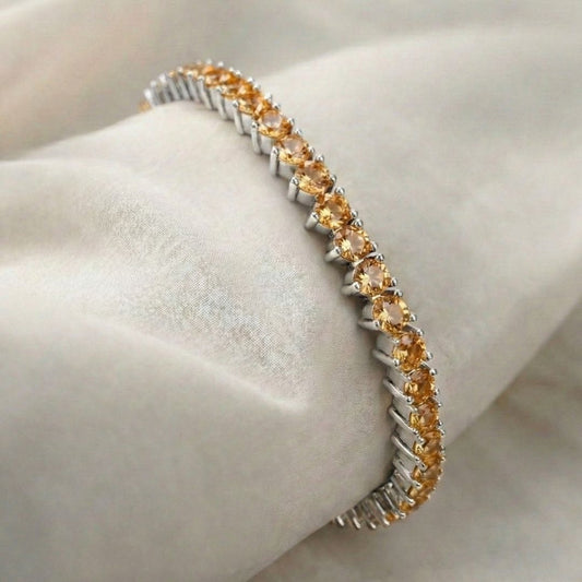 Pulseira ródio branco de rivieira 3 pontas na cor laranja claro