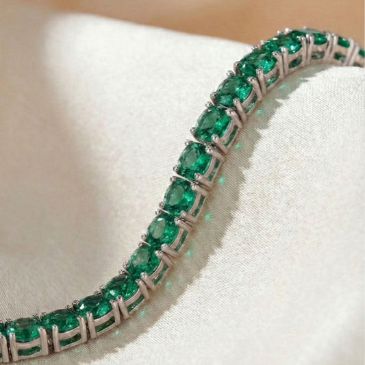 Pulseira ródio branco de rivieira 4 pontas na cor verde esmeralda