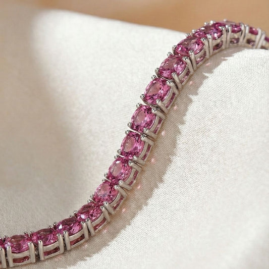 Pulseira ródio branco de rivieira 4 pontas na cor rosa pink