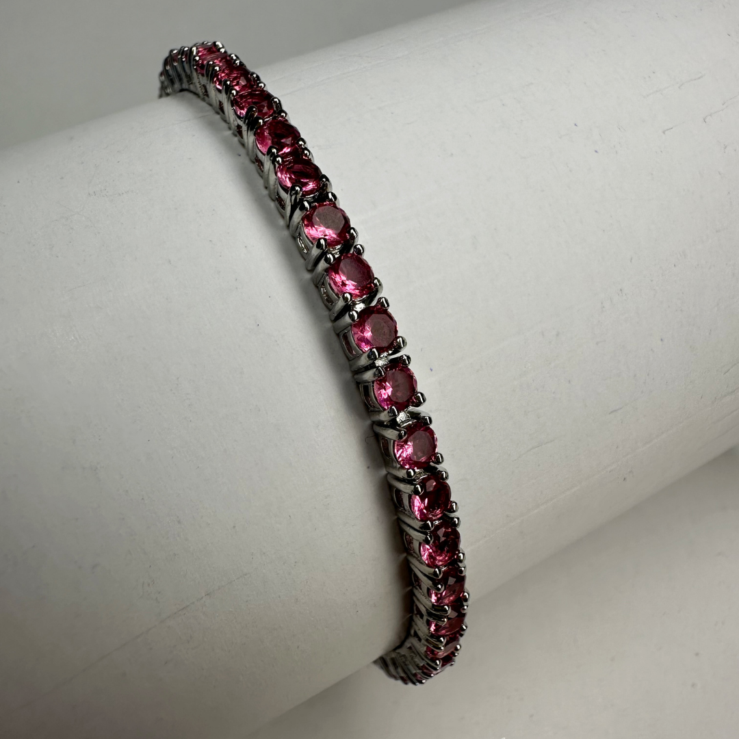 Pulseira ródio branco de rivieira 4 pontas na cor rosa pink